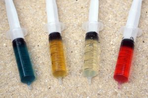Perbedaan warna minyak REM DOT dan Mineral Oil